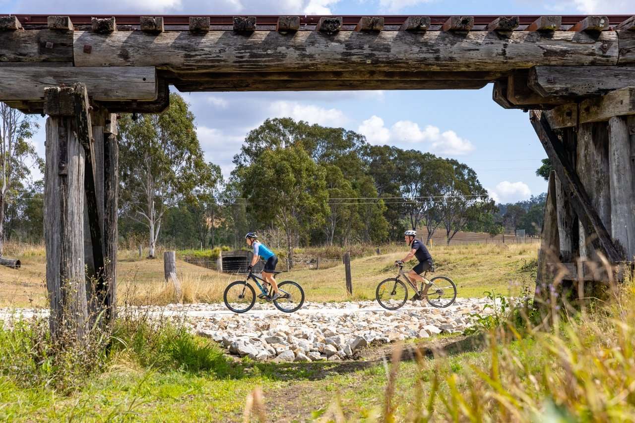 Cyclists cycling on Brisbane Valley Rail Trail